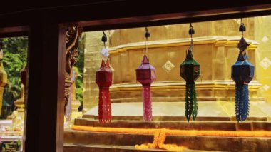 Colourful Prayer Lanterns Hanging at a Thailand Buddhist Temple at Chiang Mai, Wat Phra Singh, Used for Religious Ceremonies with Gold at a Beautiful Famous and Popular Place to Visit
