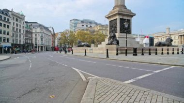Quiet, empty streets in London with no cars or traffic during Coronavirus Covid-19 pandemic lockdown at Trafalgar Square and Nelsons Column in London in the City of Westminster, England, UK