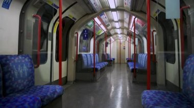 Empty Seats in London Underground tube train carriage in Covid-19 Coronavirus lockdown pandemic in England, UK showing no people, quiet and deserted