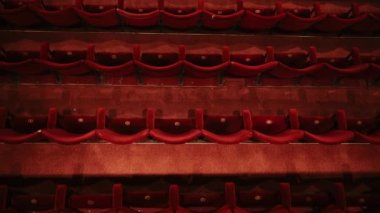 Empty theater opera house seats seen from above during Coronavirus, closed business concept affecting the arts and theatre due to Covid
