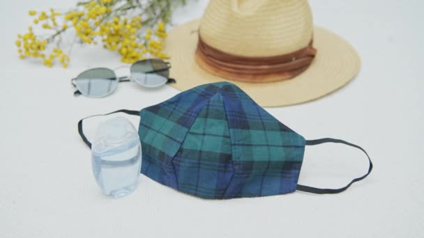 Flat Lay Coronavirus Travel Kit Fashion Mask Hand Sanitizer Sunglasses — Stockvideo