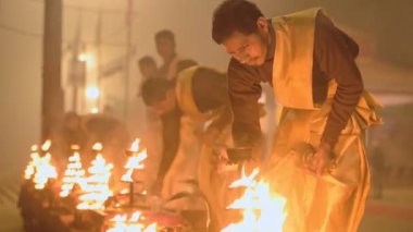 The Priests Preparing The Deepam For The Ganga Aarti Hindu Ceremony In Varanasi, Uttar Pradesh, India. -medium shot