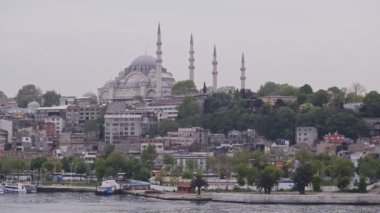 Turkish mosque landscape view across the Golden Horn, Istanbul, Turkey, at dusk