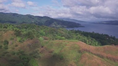 Arenal Lake and rainforest near La Fortuna, Costa Rica. Aerial drone view