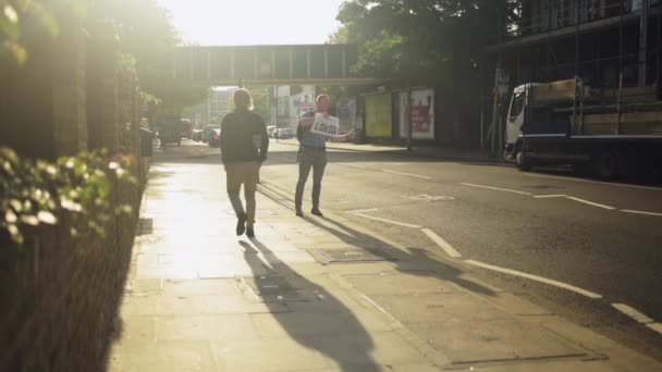 Guy Holding Sign Hitchhiking Has Thumb International Sign Lifting Sunrise — стокове відео