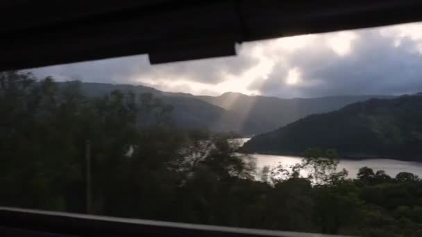 Loch Ness Landscape Moving Train Scotland Mountains Background Dusk — Stockvideo