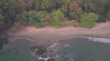 Espadilla South white sandy tropical Beach, Manuel Antonio National Park, Costa Rica. Aerial drone view