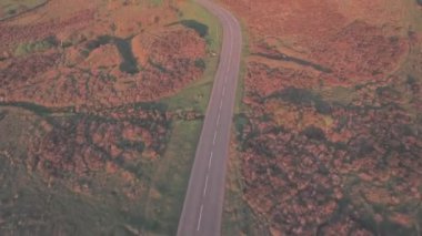 Road through Dartmoor National Park, Devon, England, UK. Aerial drone view