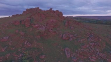 Famous english landscape in Dartmoor National Park at sunrise, Devon, England, UK. Aerial drone view