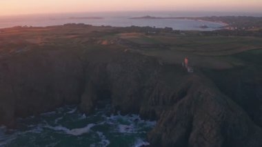 Guernsey, German observation tower from World War Two at sunset, Channel Islands, UK. Aerial drone view