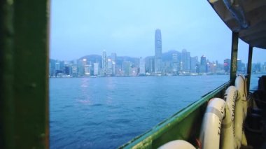 Sailing Adventure By Boat Across The Deep Blue Sea Facing The Beautiful City Landscape In Hong Kong - Wide Shot
