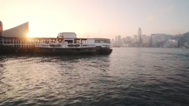 Huge Ferry Boat Docked In Port Area To Transport Passengers In Hong Kong - wide shot