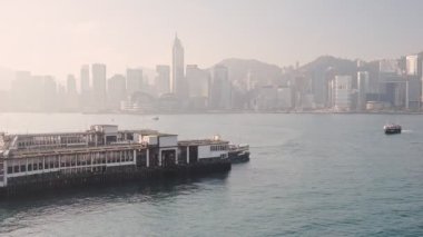Star Ferry in Victoria Harbour in China Sea Overlooking The Skyscrapers Of Central, Hongkong. -wide shot