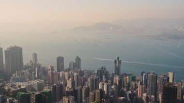 Wonderful View Of Unique Buildings and Calm Sea In Victoria Peak Hill in Hong Kong - Aerial Shot