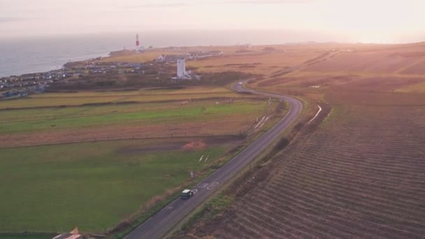 Cars Driving Portland Bill Lighthouse Dorset England Aerial Drone View — Wideo stockowe