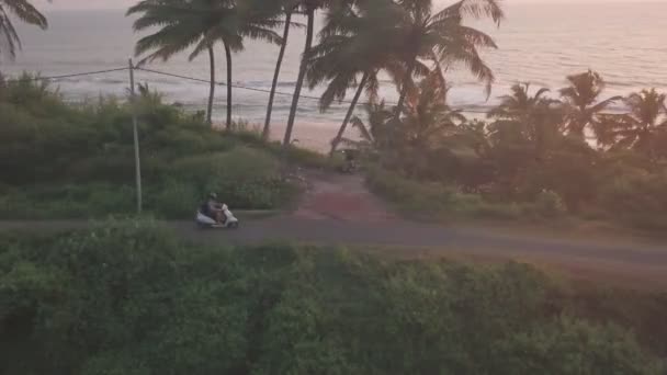 Motorcycle Rider Travelling Narrow Road Tall Palm Trees Varkala India — ストック動画