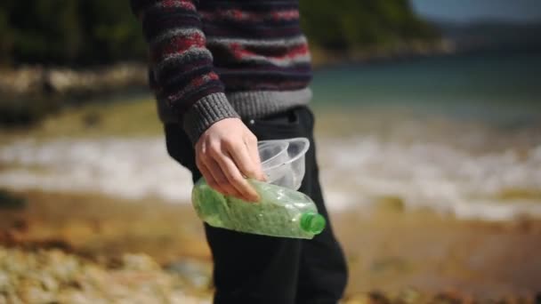 Man Striped Cardigan Collecting Plastic Materials Shoreline Hongkong Medium Shot — стокове відео
