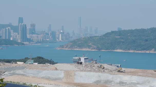 Garbage Trucks Driving Back Forth Landfill Area Hongkong Skyline Central — Stok video