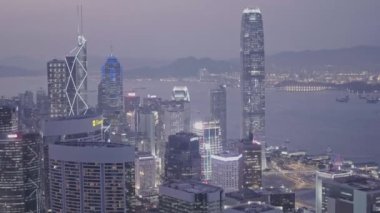 International Commerce Centre and Hong Kong downtown city skyline at night. Aerial drone view