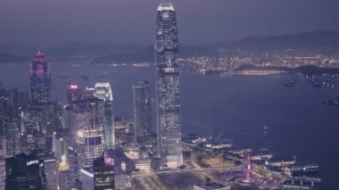 Hong Kong downtown city skyline and International Commerce Centre (ICC) at night. Aerial drone view
