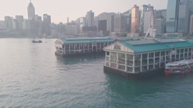 Hong Kong star ferry central terminal and harbour front. Aerial drone view