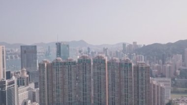 Residential buildings and skyscrapers in Happy Valley, Hong Kong. Aerial drone view