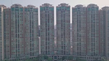Residential blocks of flats skyscrapers in Happy Valley, Hong Kong. Aerial drone view