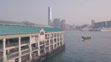 Hong Kong star ferry, central terminal and harbour front. Aerial drone view
