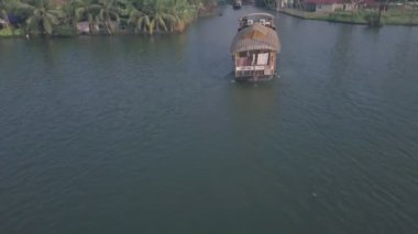 Boat trip in Kerala backwaters at Alleppey, India. Aerial drone view