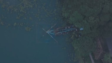 Traditional Chinese fishing nets at Fort Kochi, India. Top down aerial drone view