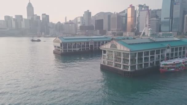 Hong Kong Star Ferry Central Terminal Harbour Front Aerial Drone — стоковое видео