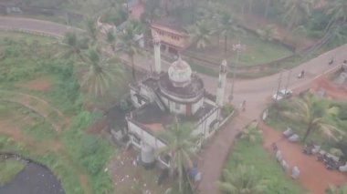 Hindu temple near Varkala in India at sunrise. Aerial drone view