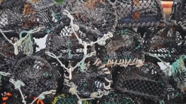 A Stacks Of Lobster And Crab Traps On The Harbour In Rathlin Island, Northern Ireland.