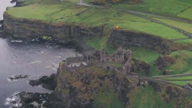 Dunluce Castle on the County Antrim Coast, Northern Ireland. Aerial drone view