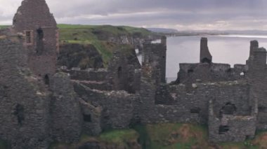 Dunluce Castle ruins, Antrim Coast, Northern Ireland. Aerial drone view