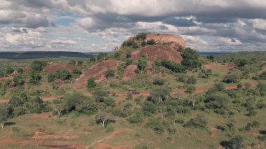 4 wheel drive adventure on wildlife safari holiday at Baboon Rock in Laikipia, Kenya. Aerial drone view