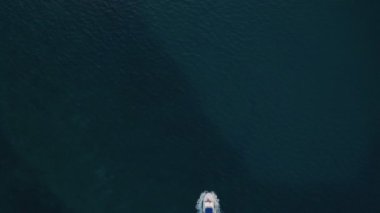 Deep sea fishing boat adventure at sunrise at Watamu, Malindi, Kenya. Top down aerial drone view