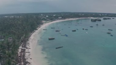 Fishing boats in Watamu Bay Beach near Malindi, Kenya. High aerial drone view