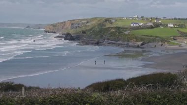 Beautiful Scenery At The Sandy Broadhaven Beach With The Green Mountains In Pembrokeshire, Wales, United Kingdom.