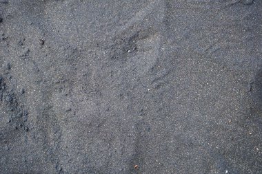 Temiz siyah kumsal dokusu.
