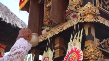 Balinese Hindus make offerings during the Piodalan ceremony. It is a form of gratitude to God Almighty.
