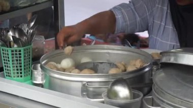 Pentol is a type of snack which can be found in Indonesia. Bakso or baso is an meatball from indonesia. it's a type of meatballs with flour, usually given with soy sauce and sambal.