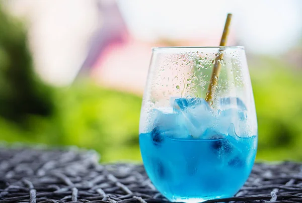 Glass Tasty Blue Mojito Cocktail Yellow Lemons Blured Background — Stock Fotó
