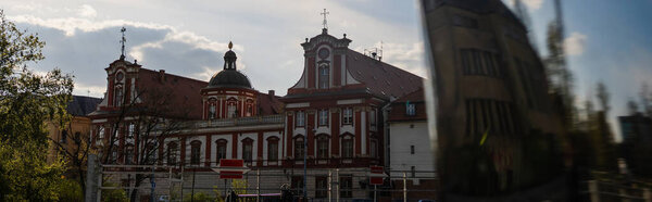 Old church on urban street in Wroclaw, banner 