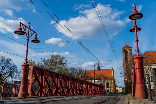 Lanterns on bridge on urban street in Wroclaw