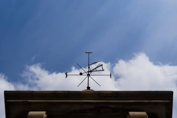 Bottom view of old vane with sky at background in Wroclaw — Stock Photo