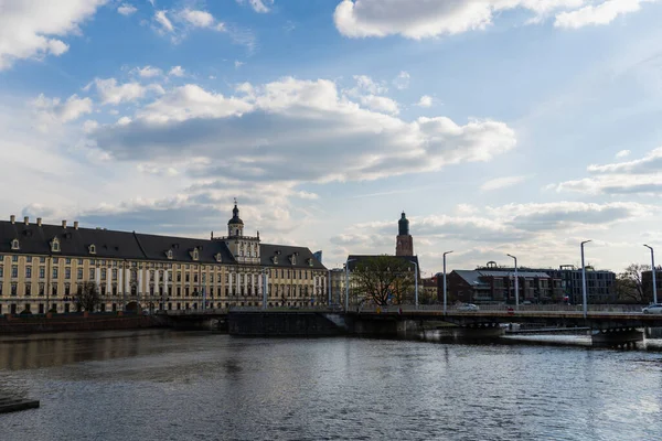 Buildings on embankment near river in Wroclaw — Stock Photo