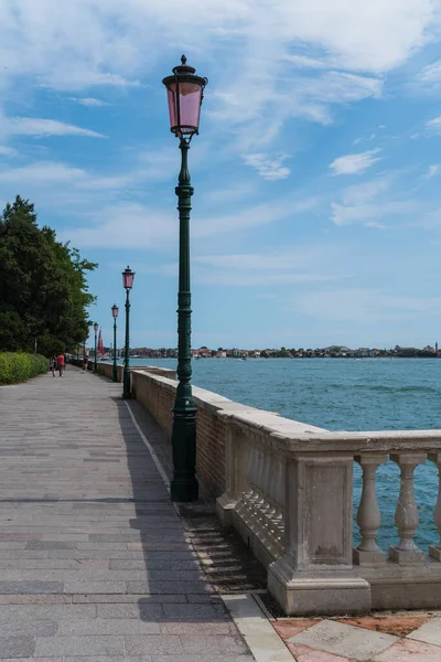 Harbor in Venice, Italy with traditional street lights