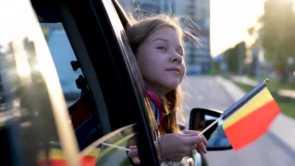 Close Cheerful Smiling Small Girl Holding Belgian Flag Looking Out — ストック動画