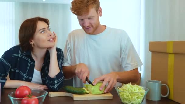 Camera Moving Back Young Happy Family Couple Preparing Food Together — Stok Video